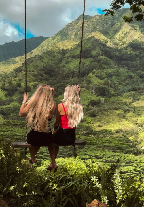 girls on a swing in Kauai