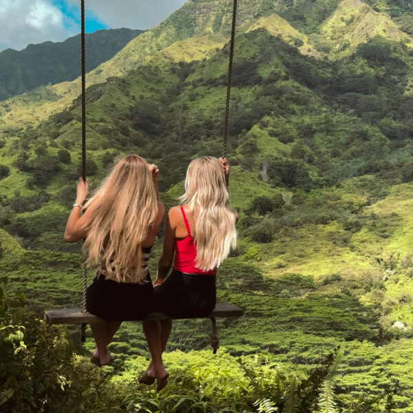 girls on a swing in Kauai