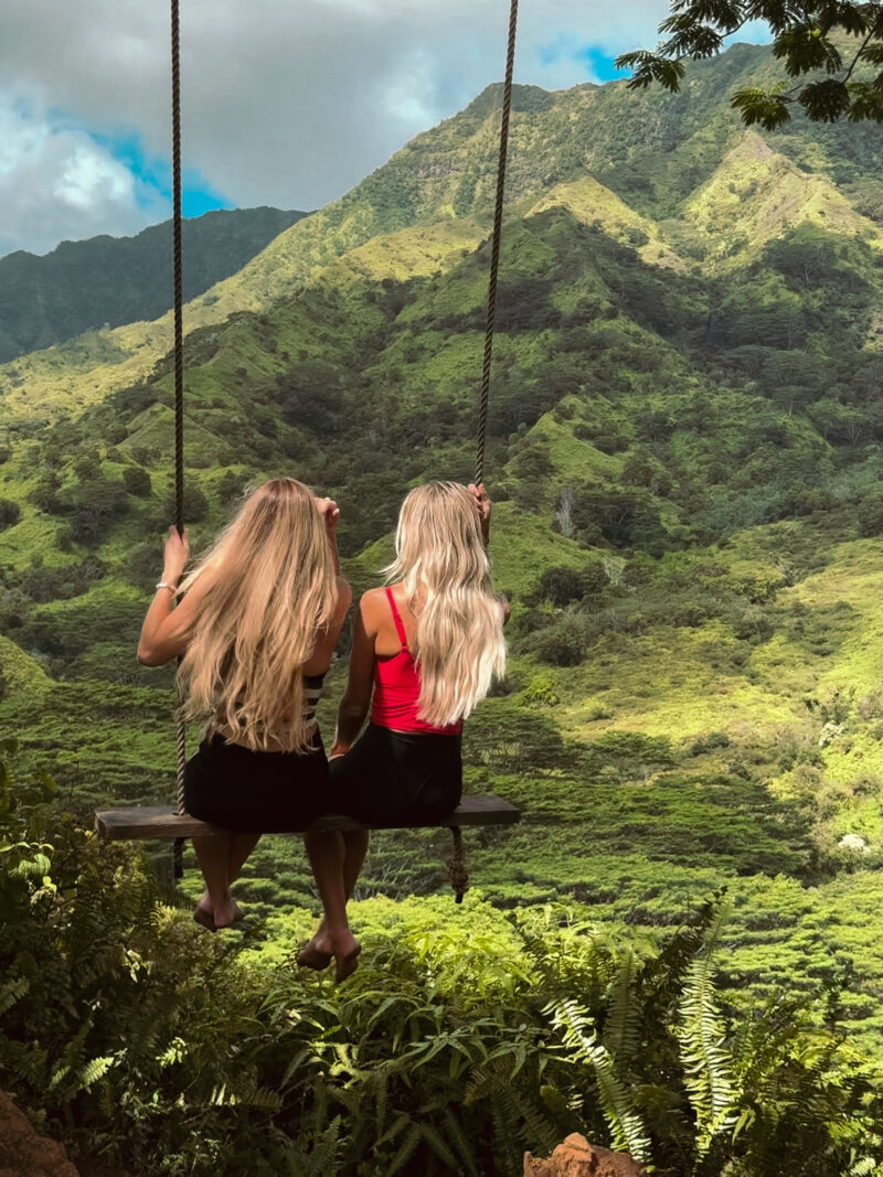 girls on a swing in Kauai